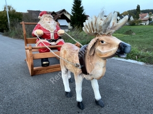 Rentierschlitten -Gespann mit Weihnachtsmann